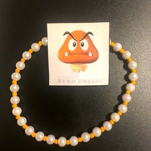 orange pearl bead goblin necklace